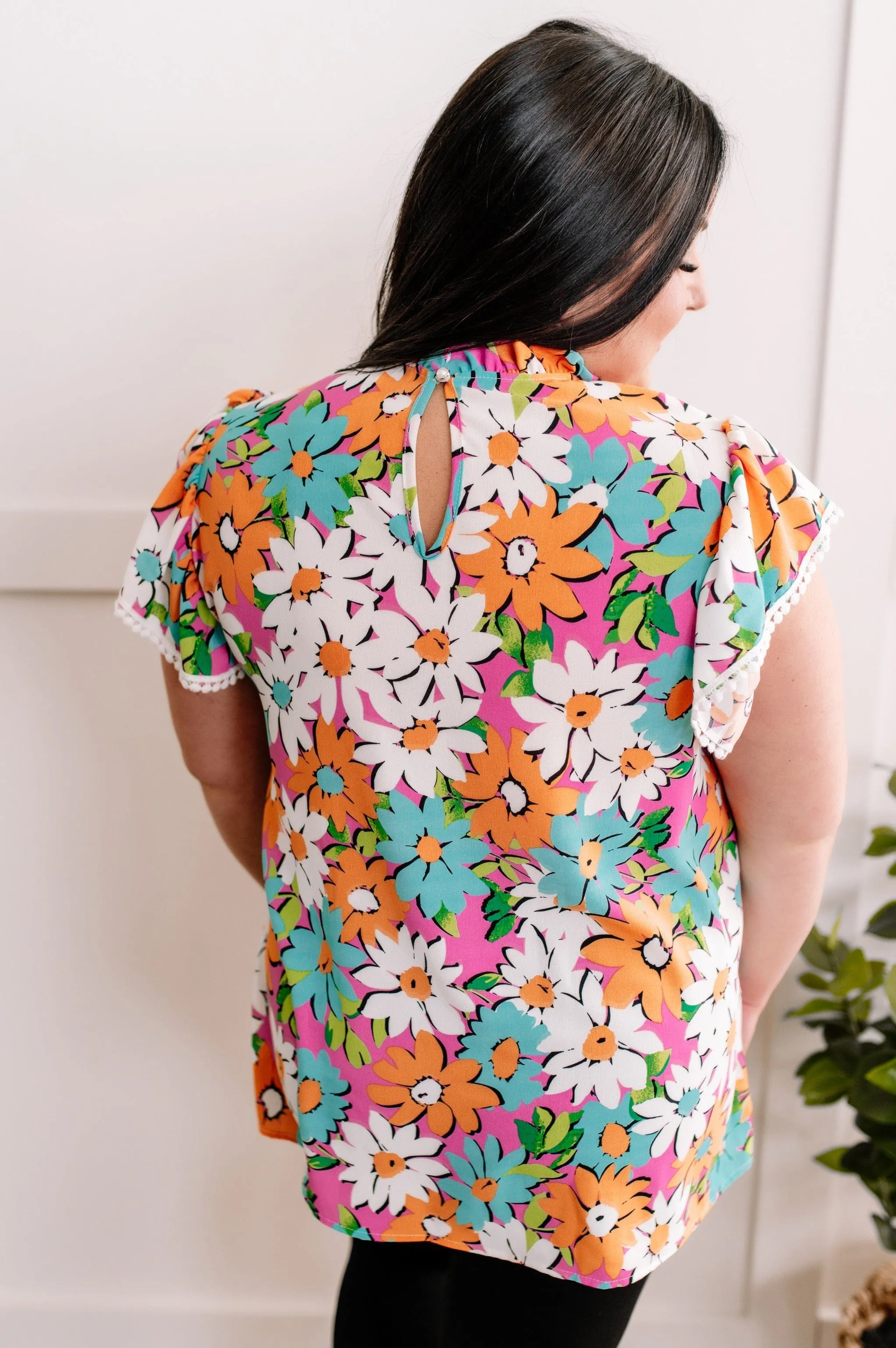 Daisy Disco Flutter Sleeve Top
